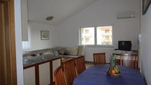 TV a/nebo společenská místnost v ubytování Apartments Vabec