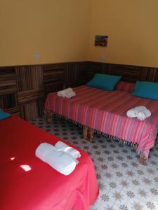 Cama ou camas em um quarto em Ciamat Camp