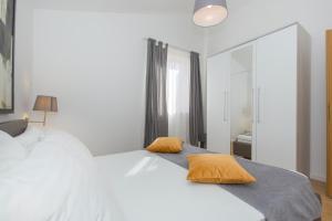 Postel nebo postele na pokoji v ubytování Apartments Agava Romantic