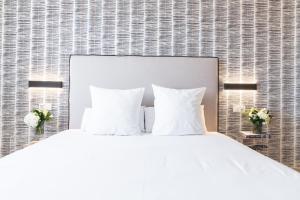 Posteľ alebo postele v izbe v ubytovaní Pacificio Beachfront