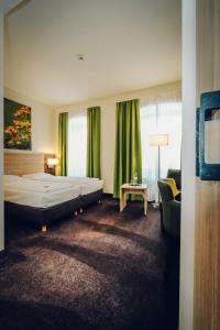 Postel nebo postele na pokoji v ubytování Hotel Europa