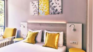 Postel nebo postele na pokoji v ubytování Carine Hotel Park