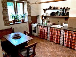 Kjøkken eller kjøkkenkrok på Apartmány Tones
