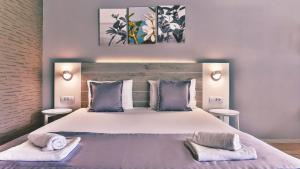 Postel nebo postele na pokoji v ubytování Carine Hotel Park