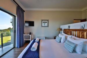 Postel nebo postele na pokoji v ubytování Mosselbos Self Catering
