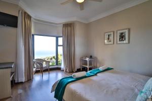 Postel nebo postele na pokoji v ubytování Mosselbos Self Catering