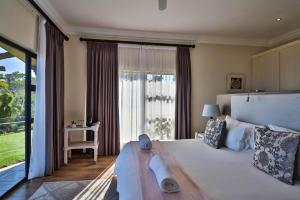 Postel nebo postele na pokoji v ubytování Mosselbos Self Catering