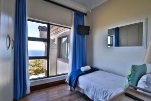Postel nebo postele na pokoji v ubytování Mosselbos Self Catering + 37 fotografií