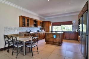 Kuchyň nebo kuchyňský kout v ubytování Mosselbos Self Catering
