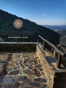 a sign at the top of a mountain at CHR Talasnal_Casa da Pedra in Lousã