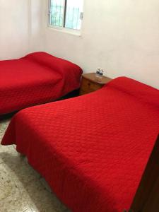 Cama o camas de una habitación en Casa Bahia Departamento1
