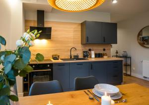 Kuchyňa alebo kuchynka v ubytovaní Apartament A7