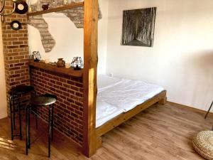 Postel nebo postele na pokoji v ubytování Apartmány Tones + 21 fotografií