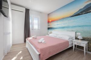 Postel nebo postele na pokoji v ubytování Apartment Second Ivana