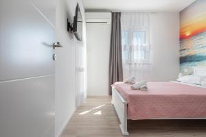 Postel nebo postele na pokoji v ubytování Apartment Second Ivana