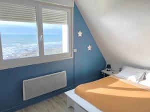 Postel nebo postele na pokoji v ubytování Villa Face Mer
