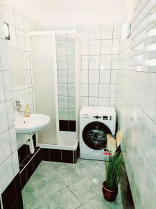 Kúpeľňa v ubytovaní Apartament Retro Promenada