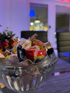 a glass bowl of food on a table at Arctic Penthouse Studio with FREE parking and high-speed Wi-Fi in Rovaniemi
