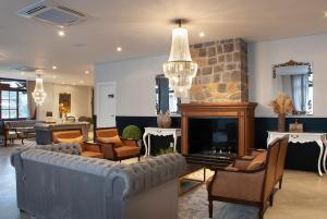 Uma área de estar em Bella Gramado Resort & Spa by Gramado Parks