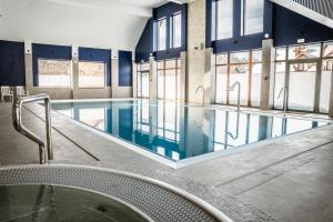 Bazén v ubytování Port Bogaczewo Hotel & SPA nebo v jeho okolí + 5 fotografií
