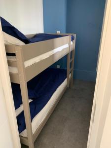 a couple of bunk beds in a room at CAP AU SUD in Hyères
