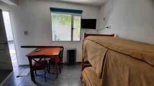Postel nebo postele na pokoji v ubytování Rada Tilly Apart Hotel