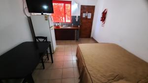 Kuchyň nebo kuchyňský kout v ubytování Rada Tilly Apart Hotel + 21 fotografií