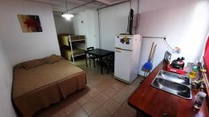 Kuchyň nebo kuchyňský kout v ubytování Rada Tilly Apart Hotel