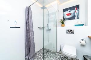 Koupelna v ubytování Bright - Neptun Park by OneApartments