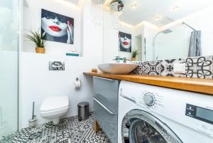Koupelna v ubytování Bright - Neptun Park by OneApartments