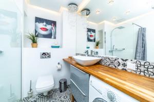 Koupelna v ubytování Bright - Neptun Park by OneApartments