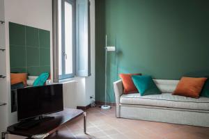 TV tai viihdekeskus majoituspaikassa Brera Apartments in Porta Romana