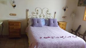 Cama o camas de una habitación en Alojamiento y habitacionesla cañada monfrague