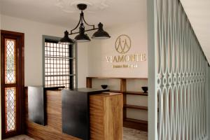 a lobby with a sign that reads wanomine at VIAMONTE House Boutique in León