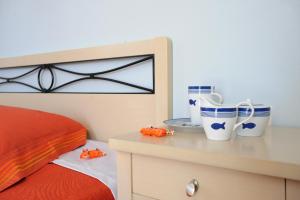 Letto o letti in una camera di Aigaio Studios tinos