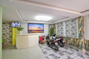 TV a/nebo společenská místnost v ubytování Sunshine - Tia Nắng Mới