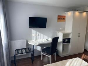 Köök või kööginurk majutusasutuses Mirage City Hotel Stuttgart Zentrum