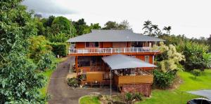 an aerial view of a house with a roof at Coffee Garden in Captain Cook