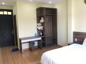 Voodi või voodid majutusasutuse Ngoc Tran Hotel toas
