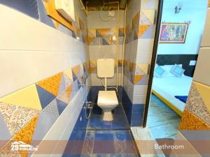 a bathroom with a toilet in a room at 5BR Rajkarn Boutique Villa by 29Bungalow in Udaipur