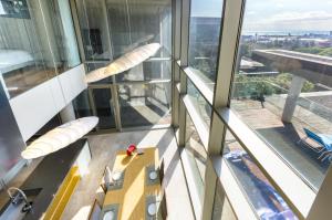 a view from the top of a building with windows at Bayhill Pool & Villa in Seogwipo