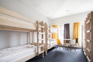 Un pat sau paturi într-o cameră la Polin House
