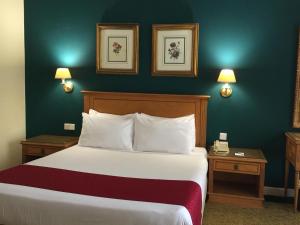 Rúm í herbergi á Amarante Pyramids Hotel