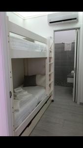 Letto o letti in una camera di I Quattro Elementi