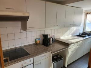 Kuchyň nebo kuchyňský kout v ubytování Apartment 13