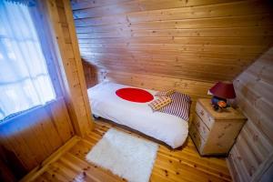 a small room with a bed in a sauna at Kedra Village in Kédra