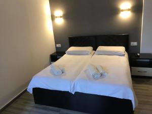 Letto o letti in una camera di Hotel Niko