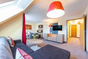 TV a/nebo společenská místnost v ubytování Centralhotel Binz
