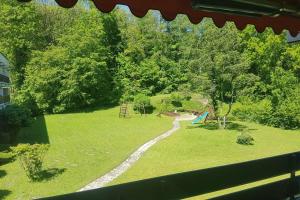 a view of a park with a path in the grass at Jutta Deluxe Apartment #325 in Bad Reichenhall