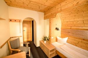 Postel nebo postele na pokoji v ubytování Bavaria Biohotel